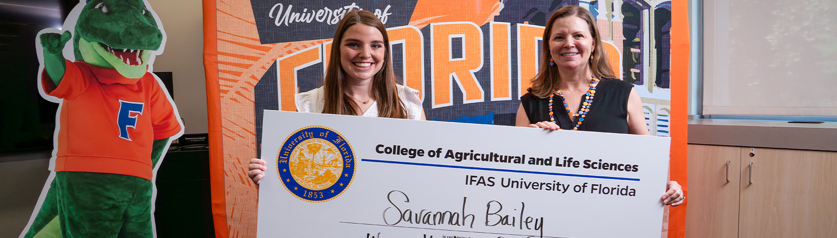 Dean Migliaccio posing with student who received a CALS Scholarship